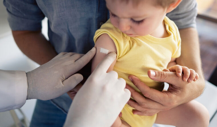 Young child getting vaccinated