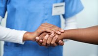 Doctor holding a patient