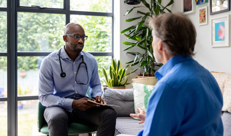 GP and patient talking.