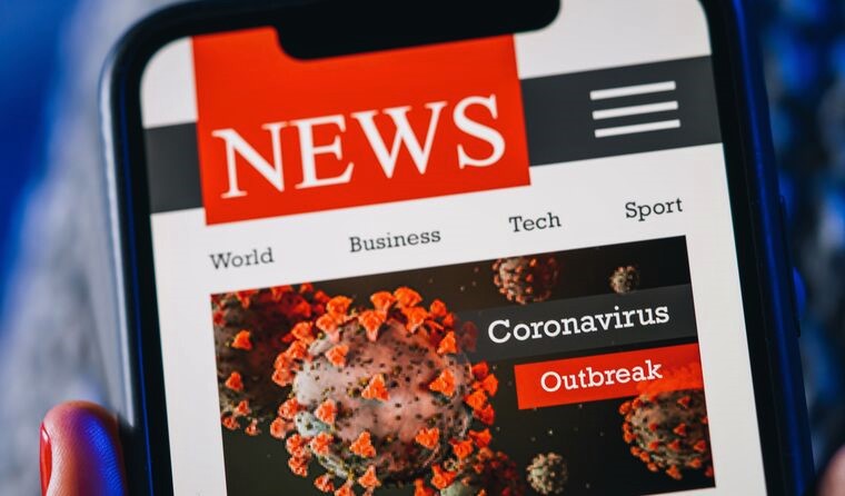 Coronavirus news story on smartphone.