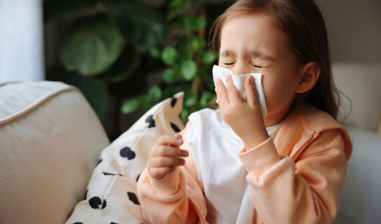 A child feeling sick with flu