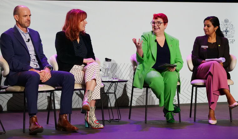 A picture of all speakers and host on stage.