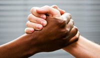 Black and white person shaking hands