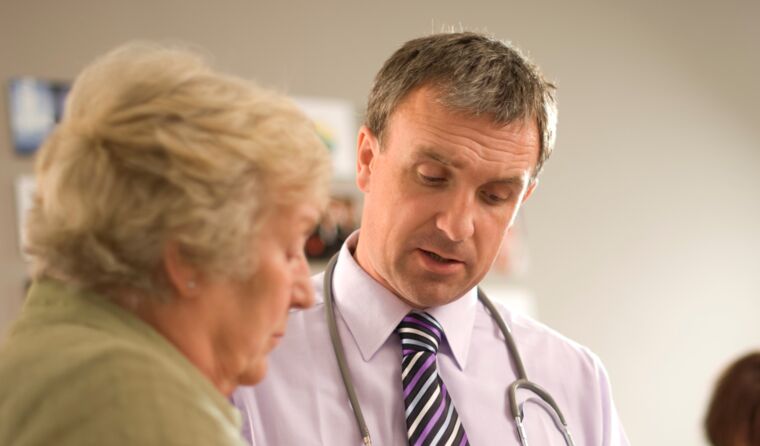 GP with elderly patient