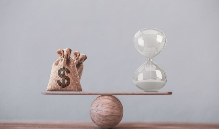 A scale balancing time and money.