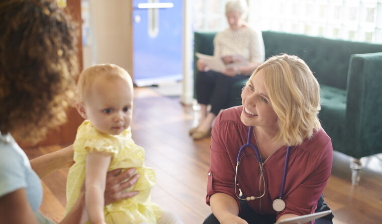 Doctor with a baby.