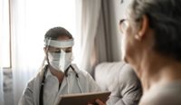 Aged care GP in full PPE
