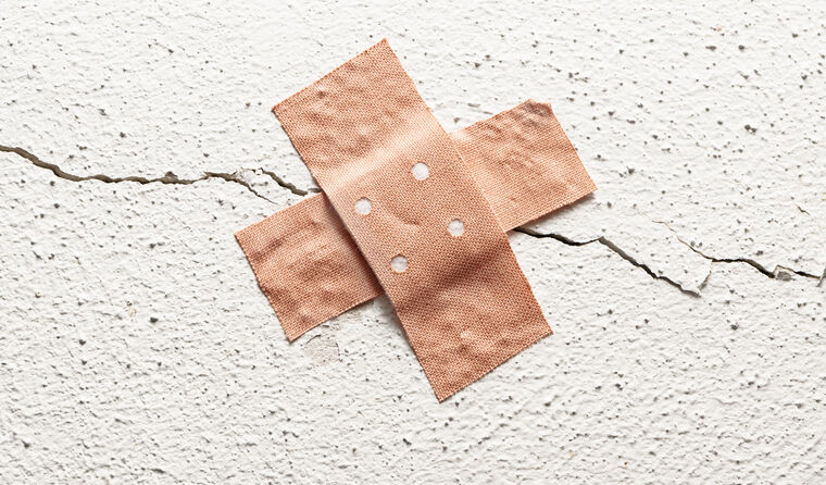 Bandaid over cracked wall