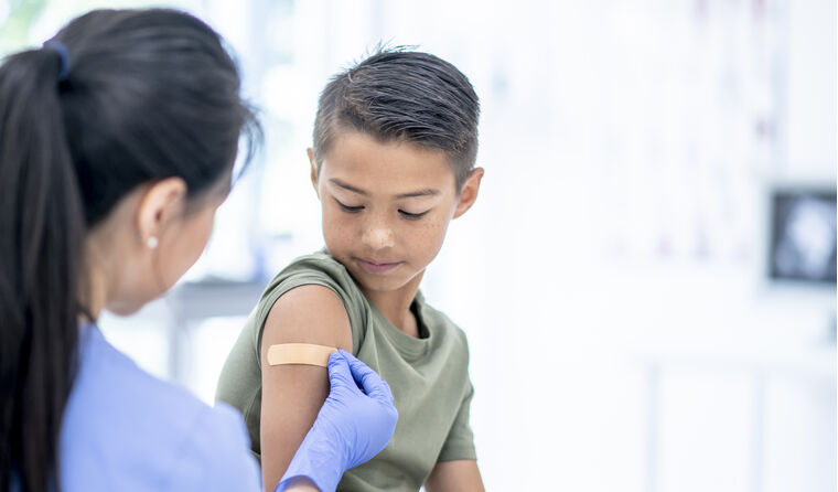 Young person getting flu vaccine