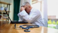 Overworked doctor