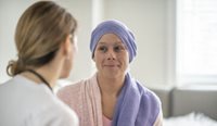 Female cancer patient with doctor