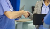 Health professionals shaking hands