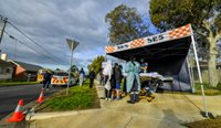 A mass testing campaign has seen more than 93,000 samples collected in hotspot suburbs the past three days. (Image: AAP)