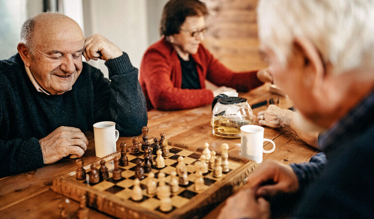 Older people playing chess