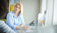 Female GP and patient