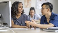 Two medical students talking.