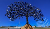 A memorial tree sculpture erected outside Parliament House ahead of Prime Minister Morrison’s apology to victims and survivors of institutional child sexual abuse. (Image: Lukas Coch)