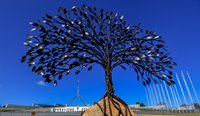 A memorial tree sculpture erected outside Parliament House ahead of Prime Minister Morrison’s apology to victims and survivors of institutional child sexual abuse. (Image: Lukas Coch)