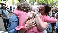 Women embrace outside Federal Court in Sydney after the vaginal mesh class action judgement was handed down in November 2019. (Image: AAP)