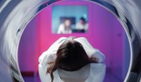 A woman undergoing an MRI.