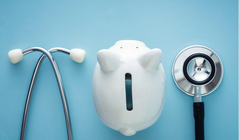 A stethoscope and a piggy bank. 