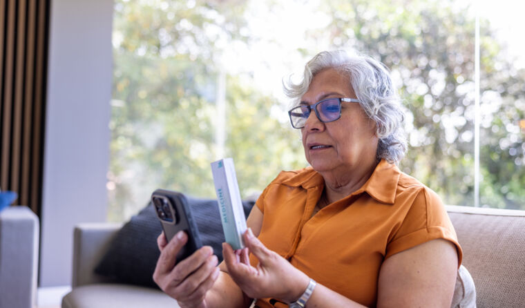 Patient using telehealth on phone.