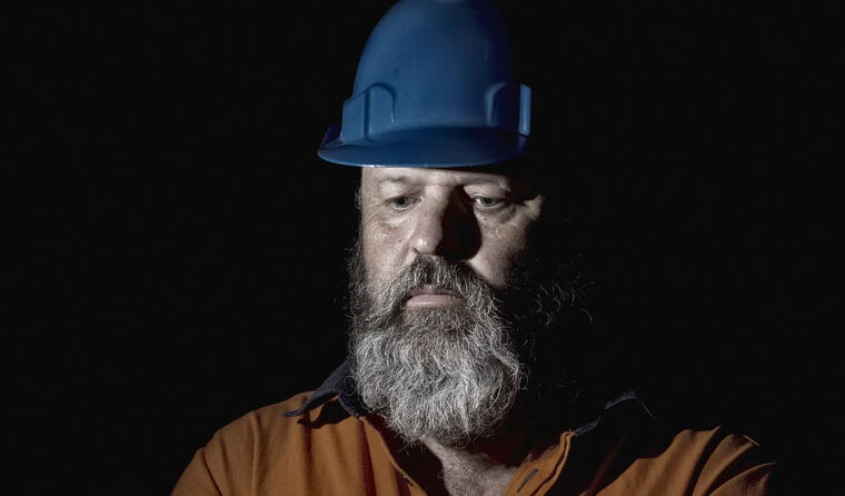 Portrait shot of a miner