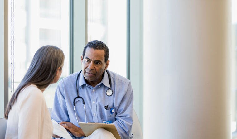 GP talking with patient