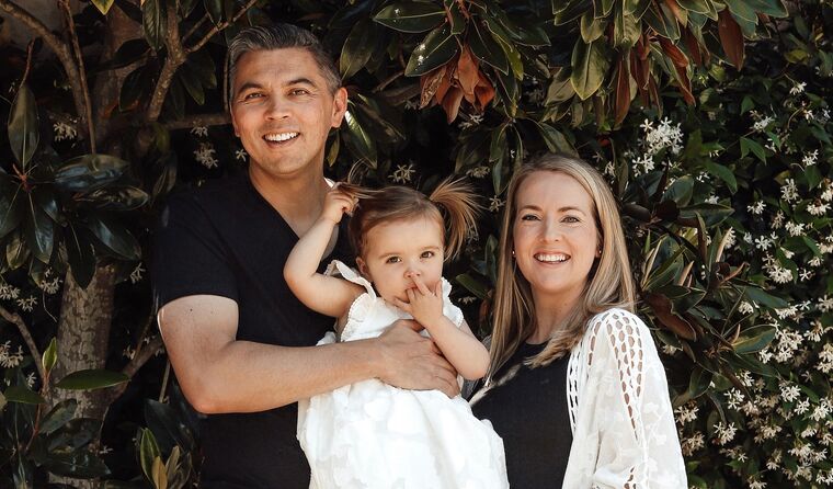 Marcelle Cooper with her husband and daughter.