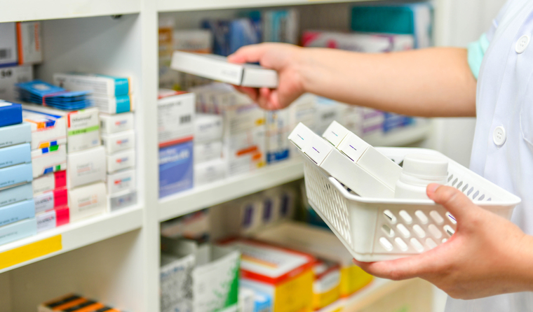 A pharmacist dispensing medication.