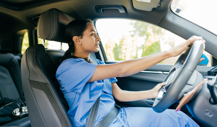 Doctor driving a car.