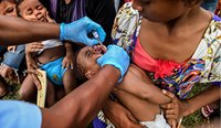 The PNG Government will roll out a rapid response vaccination campaign in Port Moresby from 24 September, moving nationwide in October. (Image: AAP)