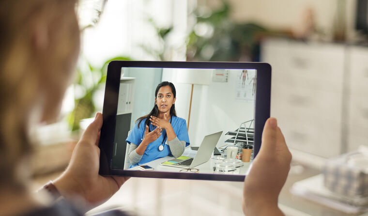 Patient on video call with nurse