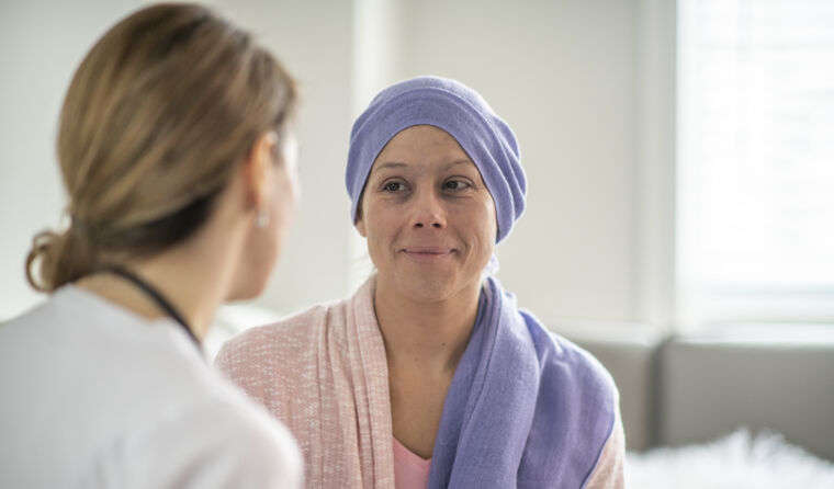 Female cancer patient with doctor