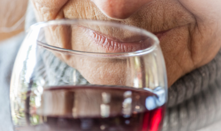 Older woman drinking