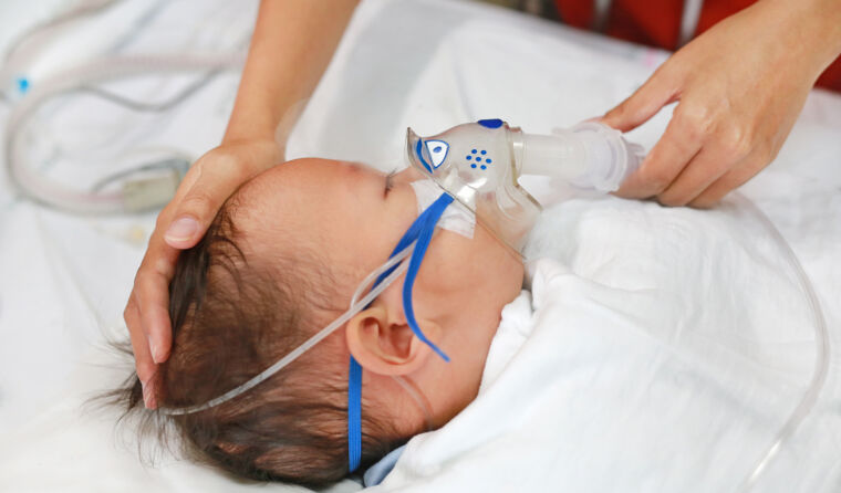 Ill infant in hospital