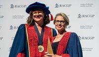 Dr Margaret Garde receiving the Brian Williams Award from RACGP President Dr Nicole Higgins. (Image: Adam Thomas)