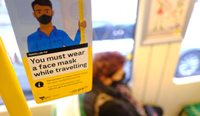 In many parts of Australia, people are already required to wear masks on public transport. (Image: AAP)