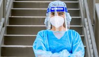 A healthcare worker wearing PPE.