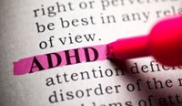 Definition of ADHD highlighted in dictionary