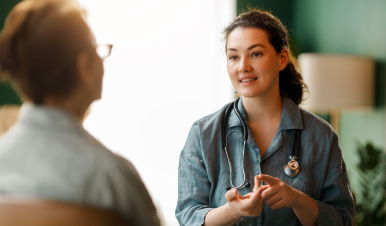 GP speaking to a patient.