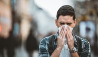More than a third of respondents with cold- or flu-like symptoms spent time in public.