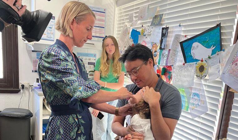 Dr Rebekah Hoffman giving the needle-free flu jab.