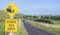 School sign on rural road