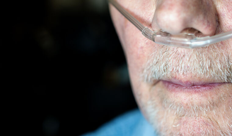 Man with nasal oxygen cannula