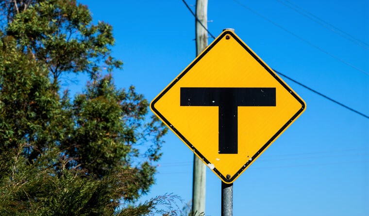 T junction road sign