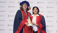 Dr Anju Aggarwal receiving her RACGP GP of the Year Award from college President Dr Nicole Higgins.