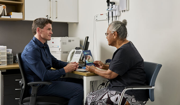 GP speaking to a patient. 