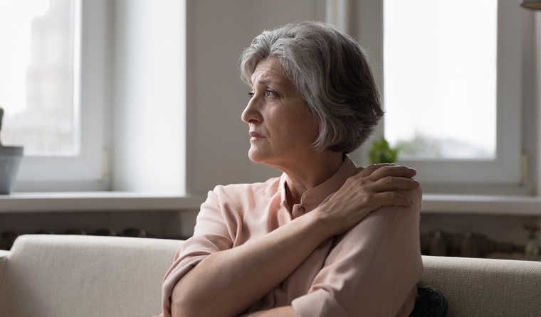 Older woman looking sideways.