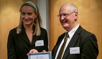 Dr Lara Roeske and Mr Jim Chambers accept the Most Outstanding GP award on behalf of Dr Donald Lewis.